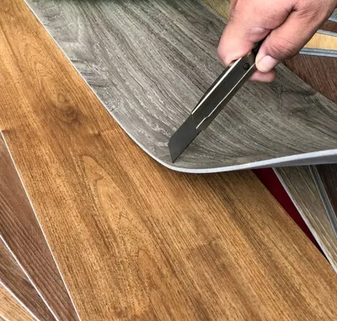 Stylish laminate flooring installation by SpeedoFix, offering an affordable alternative that mimics wood or stone