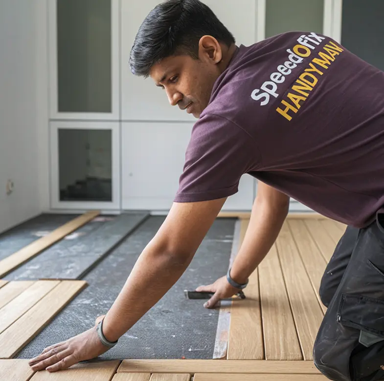 SpeedoFix handyman installing wooden flooring in a villa at Meadows, Dubai.
